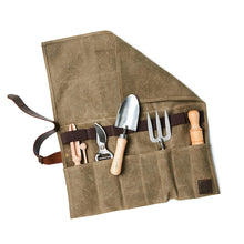 Load image into Gallery viewer, Waxed canvas utility roll to store small gardening implements or tools. Industrial stitched leather closure strap.
