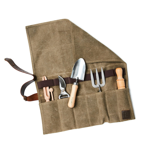 Waxed canvas utility roll to store small gardening implements or tools. Industrial stitched leather closure strap.