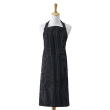 Load image into Gallery viewer, Black and white pinstripe apron in durable cotton with front pocket and adjustable straps.
