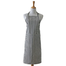 Load image into Gallery viewer, Apron in blue and white stripped cotton  with front pocket and adjustable straps.
