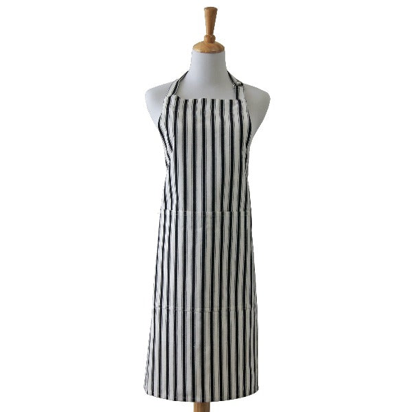 Apron in blue and white stripped cotton  with front pocket and adjustable straps.