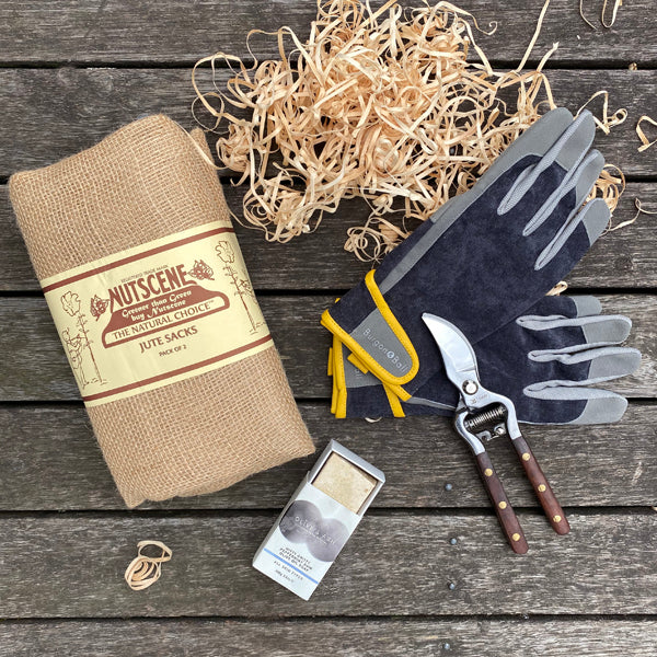 Dad's Gardening Hamper includes Jute Sacks, National Trust Secateurs, Gardeners Soap and Gardening Gloves.