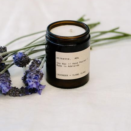 Hand poured Soy Candle in amber jar,  with fragrance notes of lavender + ylang ylang.